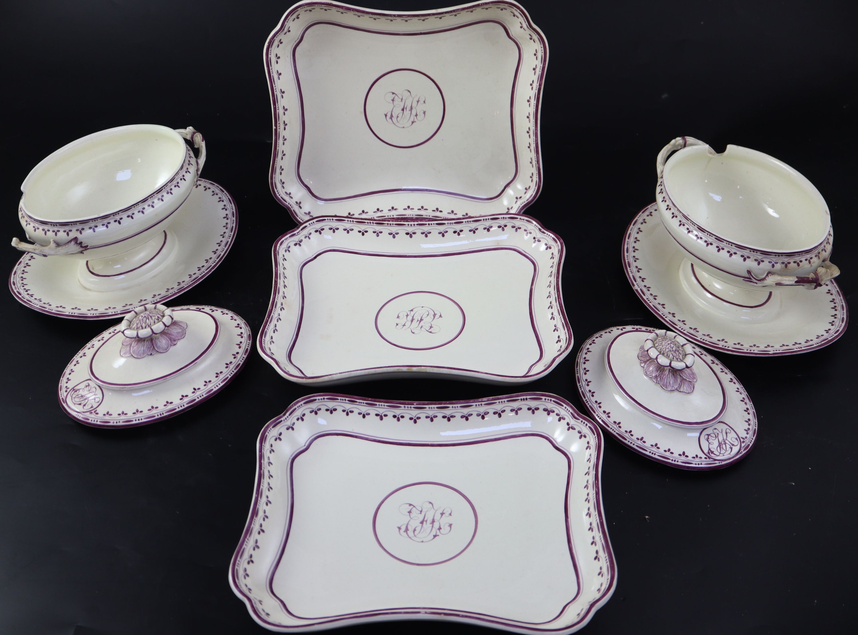 A pair of Wedgwood creamware oval sauce tureens, covers and fixed stands, and three matching serving dishes, c.1800, width 22cm